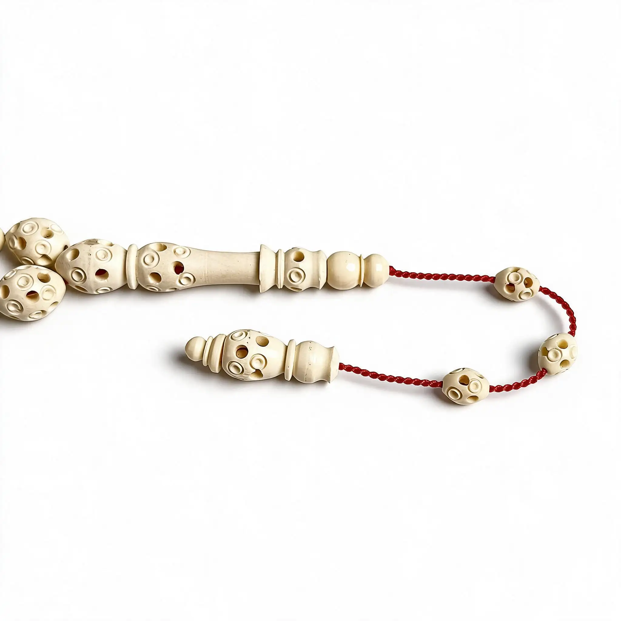 hollowed-camel-bone-rosary-imame-p5 تفاصيل شاهد مسباح عظم جمل مفرغ يدوياً مع السبيرات التفصيلية المخروطة othmani.co